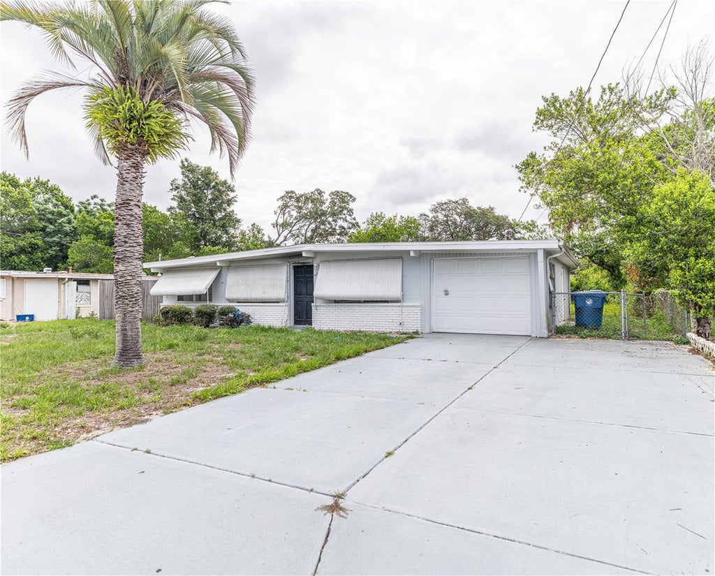Photo of 4050 Arrowhead Avenue, Spring Hill, FL 34606 (MLS # TB8516972)