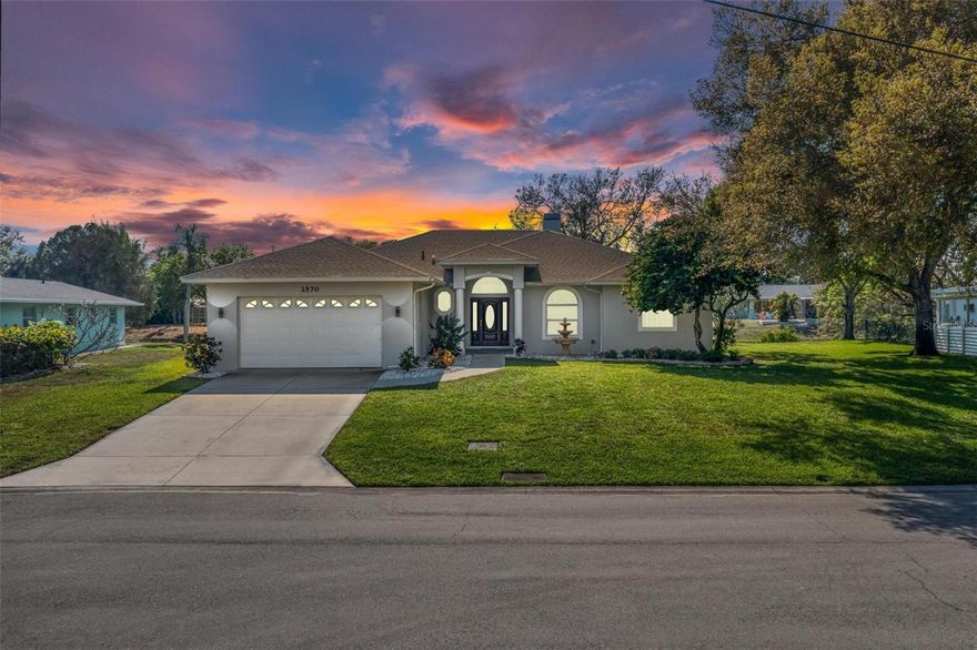 SELLER WANTS AN OFFER! Welcome to the tranquil community of South Gate on secluded River Ridge Drive where you may canoe and kayak in Phillippi Creek right behind your home! This is the home you will be proud to entertain your guests in with water frontage, soaring 23 ft. cathedral ceilings, optional community pool with clubhouse and gorgeous sunsets. Enjoy the therapeutic fountain by the covered entry with etched glass entry door. Foyer with half bath and coat closet. Large living room for relaxing boasts soaring cathedral ceilings, plant shelves, gas fireplace with wood floors and disappearing sliding glass doors to lanai. Spacious Dining Room to entertain family and friends with lovely bay window and double doors to lanai. Beautiful Kitchen with breakfast bar, stainless steel appliances, backsplash, and closet pantry. Office/Den/Nursery has double glass doors to Living Room with closet. Spacious Master Bedroom has double glass doors to lanai, double tray ceiling, mini-split air conditioner for extra comfort, walk-in closet and niche. Lovely Master Bathroom opens to office/den/nursery with jetted garden tub, dual sinks, walk-in shower, linen closet and water closet. Second bedroom with mini-split air conditioner for extra comfort and closet. Third bedroom with closet. Guest bathroom with tub/shower combo and vanity. Split open floor plan. Under air laundry room with washer, dryer, cabinets and laundry tub. 10 ft. high ceiling throughout. Large 2 car garage with extra space for storage and attic access. Huge lanai with finished concrete floors and screen door to backyard for peaceful mornings drinking coffee watching the wildlife, listening to the birds chirp and evenings watching the spectacular sunsets. BRAND NEW ROOF 1 YEAR AND BRAND NEW A/C MARCH 2023. Shue Kaufman quality construction. Immaculately maintained. Close to shopping dining, arts/culture, major league sporting events, theme parks, and only 6 miles to world famous #1 Siesta Key Beach. Plenty  of space to add a pool. Make this lovely home yours today and start living the Florida lifestyle!