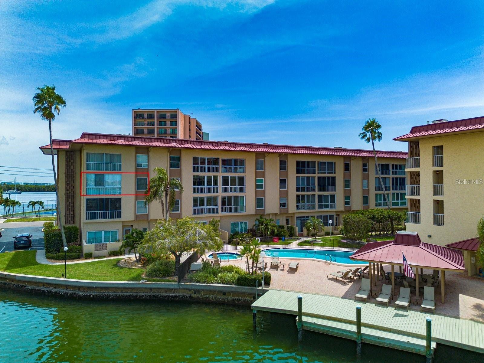 Spectacular water views from this 2 bedroom and 2 full bath fully furnished rental. Located at the Islander Complex ,this home is very nicely appointed with all modern updates. There is a water view from every room in this condo. This property is located on Island Estates. This community has a Publix grocery, bank, restaurants, gas station and is 20 minutes to 2 International air ports. This complex has a laundry room on every floor. There is a large heated pool, spa and shuffle board and all just a short stroll to our famous Clearwater Beach. This is a 55 plus complex. No pets allowed. This unit comes with 1 assigned under building parking spot and ample guest parking.