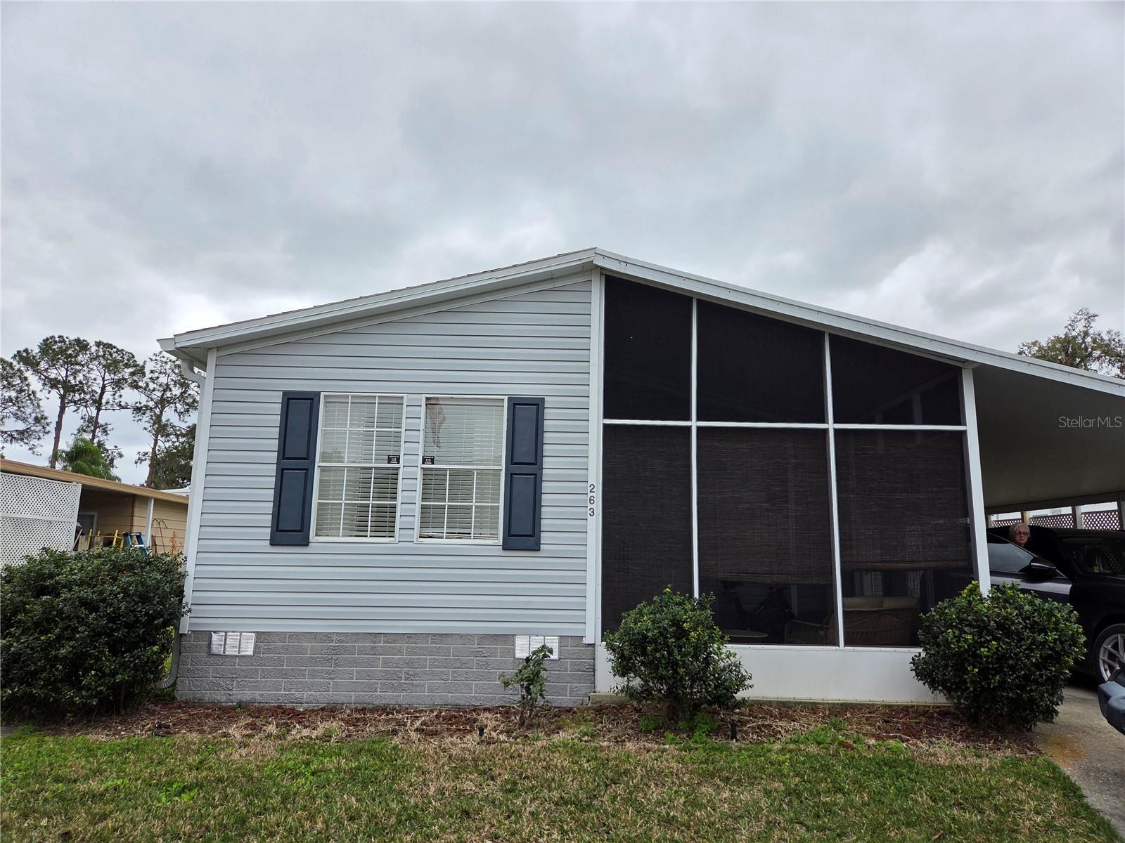 Beautiful 2005 Manufactured Home 2 bedrooms and 2 baths with additional den/Florida room . Country Club Manor Mobile home Park CO-OP 55 + community quiet, friendly, senior park. The home was renovated in 2020 including luxury waterproof vinyl flooring, new counter tops, new appliances, paint, new updated furniture. The roof was replaced 2023. Monthly fees of 220.00 which includes Club house ,Pool, water, sewer, trash. Full time or seasonal this location offers it all! Close to all grocery shopping, drug stores, take out dining options. 3 Minutes to Downtown Eustis for fine dining, shopping, festival, and beautiful lake side park. 10 Minutes to famous Mount Dora for more of central Florida's hometown charm.
Clubhouse, where there are bingo nights and karaoke sessions to delightful dinners and captivating movies. For sports fans the Clubhouse offers shuffleboard, bocce ball, and horseshoes, while the fitness fanatics work out in the fully-equipped exercise room. Those seeking relaxation can head to the tranquil heated saline pool overlooking the serene lake. Don't miss out on the boat docks along the Clubhouse seawall for a true lakeside experience.