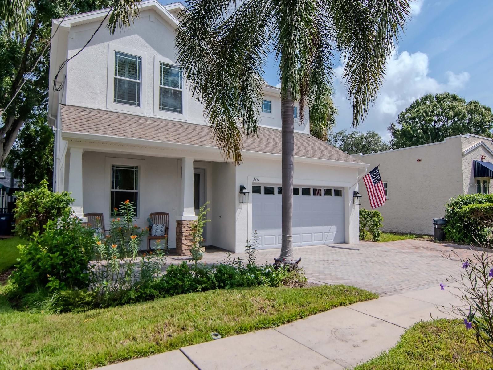 This Palma Ceia Park gem has been meticulously maintained by the original owners. This 5 bedroom/4 full bath home lives and feels so much bigger than the measured 2,676 square feet. Located in a top-rated school district (Roosevelt/Coleman/Plant), this home features an open floor plan, 3 bedrooms up and 1 bedroom and a home office down. The large kitchen boasts a large island with storage, 42” wood cabinetry with crown detail, gas cooktop, stainless steel appliances (including a newer refrigerator) and granite countertops. The downstairs bedroom and adjacent full bath make for a perfect in-law suite or can serve as a second home office. The primary suite features a generously sized bedroom, oversized walk-in closet, bathroom with double vanity and undermount sinks, garden soaking tub, large walk-in shower, and a separate WC. There are 3 secondary bedrooms upstairs: two share a Jack n’ Jill bathroom with 2 sinks; each has a double closet. And the third bedroom has a walk-in closet and an en suite bathroom. The laundry room is on the second level; there is a tub sink, and the washer and dryer convey. The owners added a second screened porch with sliders that pocket back to create a very large, screened space. The yard is completely fenced and there is plenty of green space. Both porches and the driveway are brick pavered, and the driveway can accommodate up to 5 vehicles, depending on size. Entire interior and exterior recently painted. Plantation shutters throughout. Hardwood on first level and on stairs and new carpet in all bedrooms. Tankless gas water heater. Garage fridge conveys. 17.5-foot elevation; home has never flooded. Security system with sensors on all exterior doors and windows. Located in an exclusive 5G wireless coverage zone. Unbeatable location! Walking distance to Roosevelt, Plant HS, Bay to Bay shops, and The Bayshore. A short drive to downtown Tampa and Water Street, MacDill AFB, Selmon Expressway, all major roads and shopping.