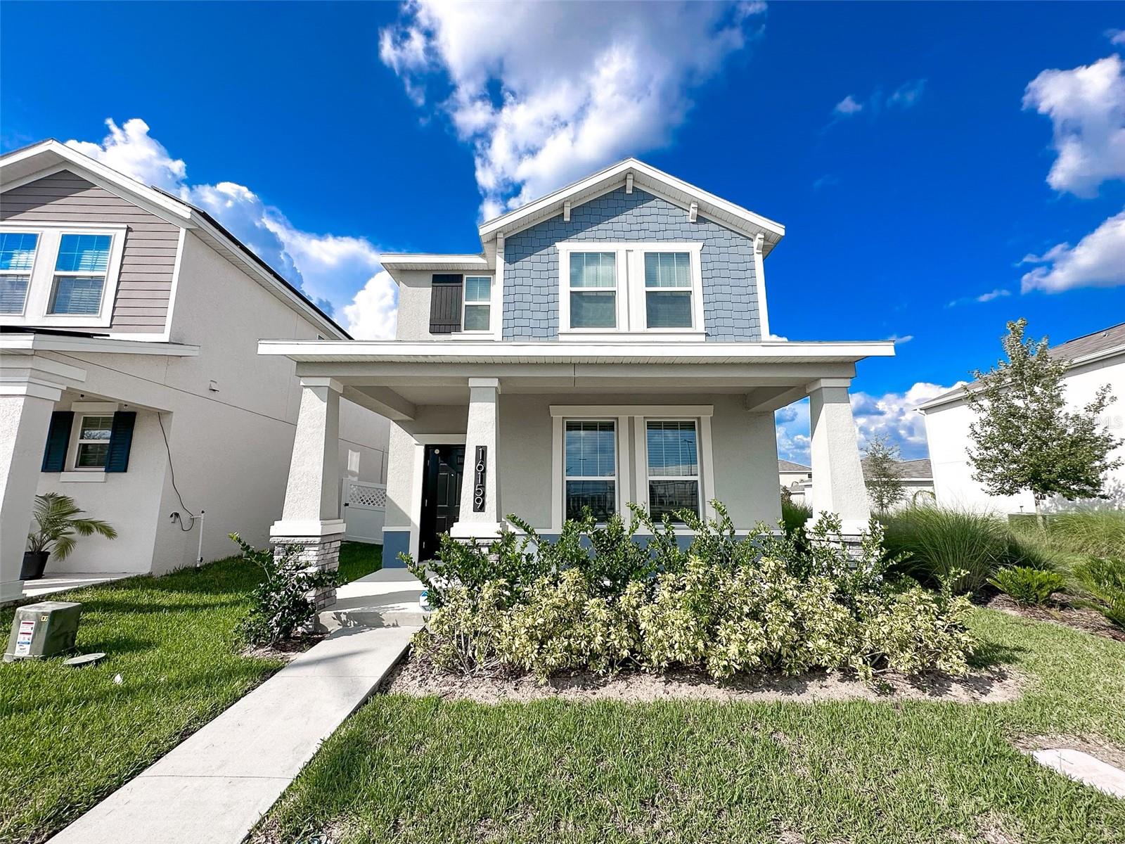 This stunning two-story home is located in the highly desirable Storey Grove community in Winter Garden. Just steps from Water Spring Elementary and Middle school, this home offers convenience and comfort in a prime location. With 4 bedrooms, 3 bathrooms, and 2,042 sq ft of living space, the open floor plan seamlessly connects the living room, dining area, and kitchen—complete with a spacious island—perfect for entertaining. Downstairs features a guest bedroom or home office with a full bath, while upstairs includes three additional bedrooms, a loft, and a built-in desk area. Enjoy peaceful outdoor living with no rear neighbors and a backyard that opens to a green space—ideal for relaxing or entertaining. *Lawn care is included in the rent for added convenience.* Residents of Storey Grove enjoy resort-style amenities including a clubhouse, fitness center, swimming pool, basketball court, and dog park. Located near SR-429, US-192, and SR-545, with easy access to Disney, Orange County National Golf Center, a brand-new Publix, and Walmart—everything you need is just minutes away.