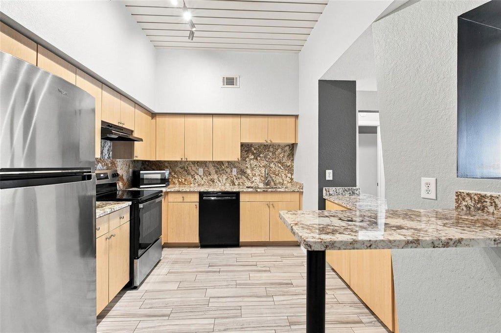 Photo of 2410 W Azeele Street #216, Tampa, FL 33609 (MLS # TB8546407)