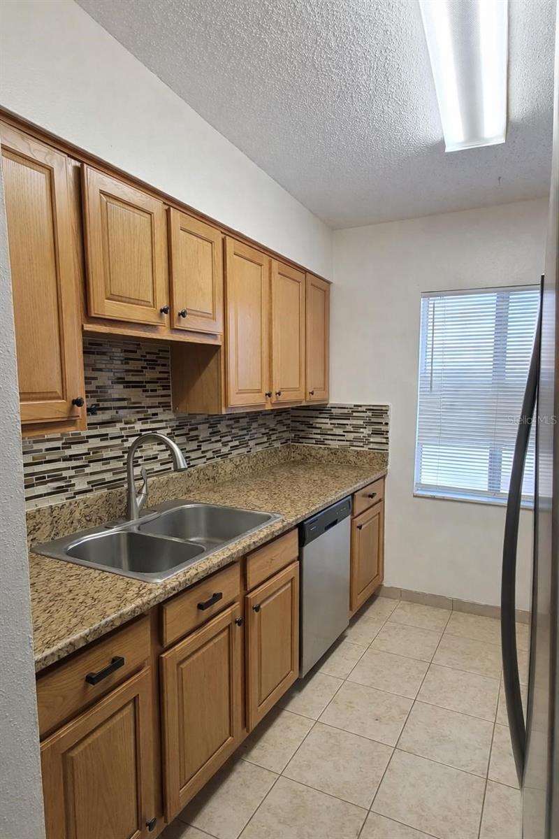 Photo of 7516 Needle Leaf Place #43, Tampa, FL 33617 (MLS # TB8537133)