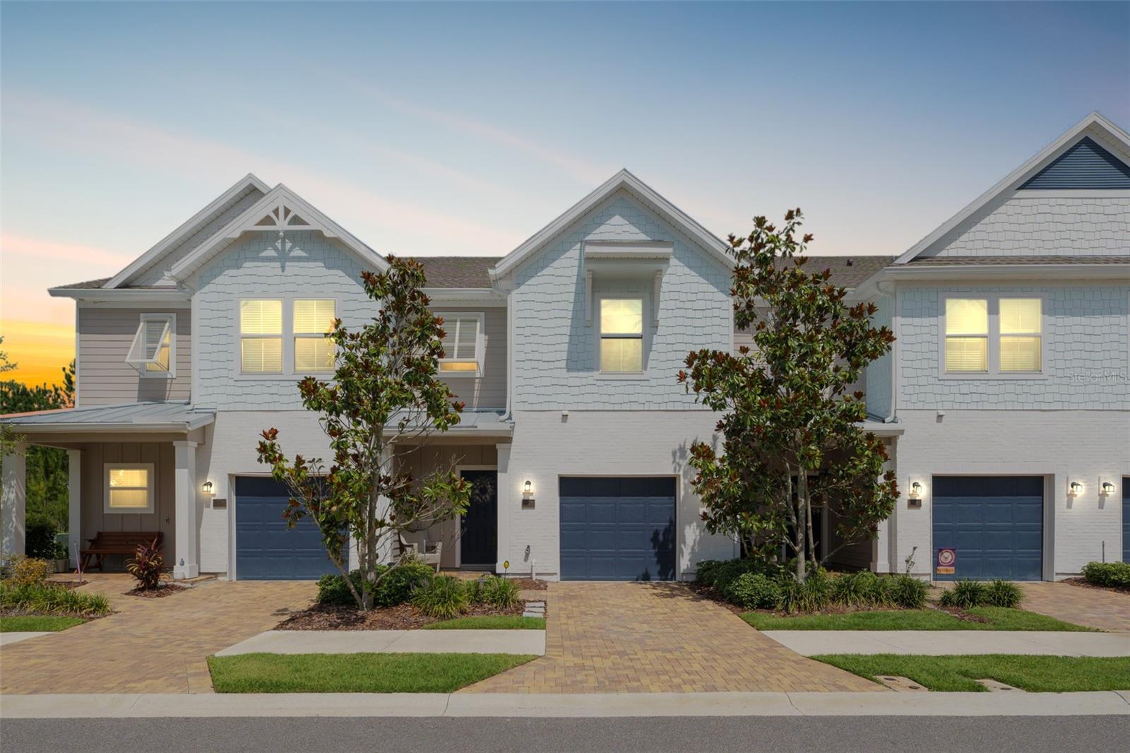 Make sure to check out the Virtual Tour for a 3D Model w/ Walkthrough, Floor Plan w/ Measurements, Video, & more! This fresh, stylish townhouse is exactly what you're looking for - with just the right amount of personality, 30 Yeti Court in St. Augustine delivers, and then some! Tucked away into the highly sought-after Shearwater Community, this 2-story Townhouse offers 1,611 square feet of smart living space and 2,010 total square feet under roof, with 2 bedrooms, 2.5 bathrooms, and a 1-car garage. Built in 2022, this Townhouse has been METICULOUSLY maintained, feels brand new, and features awesome upgrades that take it well beyond builder-grade! Downstairs, the open kitchen-living-dining combo and half bathroom is perfect for entertaining, keeping everyone connected and conversation flowing! The kitchen is a showstopper with sleek gray quartz counters, stainless steel appliances, and beautiful upgraded wood-look tile floors that run throughout most of the home. Ready to relax? Step outside into your screened-in porch for a quiet view of greenbelts that lead to the preserve - no neighbors staring at you here! Upstairs, you’ll find both master suites (Yes, you read that right, TWO master suites) with the laundry room located right in between! The spacious main master suite overlooks the serene greenbelts and provides a huge walk-in closet and a private bath. The second master suite also has its own en suite bathroom and walk-in closet, making it perfect for guests, a roommate, or a very spoiled family member! Every bathroom shines with updated lighting, mirrors, and fresh paint - hello boutique hotel vibes! …and the cherry on top? A whole-house water softener system! Living in Shearwater means you also get access to an incredible list of amenities: a resort-style lagoon pool with waterslide, a lazy river, fitness lodge, tennis and pickleball courts, miles of trails, playgrounds, and a kayak launch to name a few! Exterior maintenance? Done! The HOA takes care of the lawn and landscaping, so you don’t have to lift a finger. And this home is close enough to the amenities center that you don’t need a golf cart to get there, and far enough away that “people having fun” won’t annoy you when you’re trying to unwind. Ideally located just minutes from I-95 for easy commuting, Shearwater puts you close to it all - top-rated St. Johns County schools, shopping and dining at Durbin Pavilion, World Golf Village, and the charming streets (and beaches!) of historic St. Augustine. Parks, healthcare, and even Jacksonville’s big-city entertainment are all within reach, making this a truly convenient place to call home! This is the kind of home that makes life easier and more enjoyable - with style, comfort, and plenty to do just steps away. Schedule your tour today and see why 30 Yeti Court is the perfect blend of charm, convenience, and community!