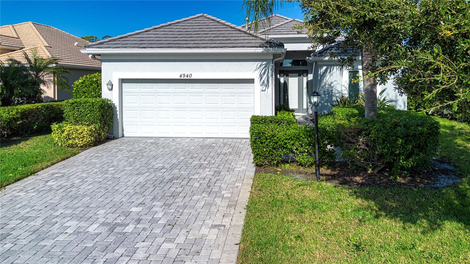 Welcome to 4940 Tobermory Way, a beautifully furnished rental home located in the highly desirable Rosedale Country Club community of Bradenton, Florida. This 2-bedroom plus den/office residence offers 1,999 square feet of stylish, open-concept living designed for comfort, convenience, and relaxation.
Step inside to discover a bright and inviting interior where modern furnishings, luxury finishes, and thoughtful details create a true turnkey experience. The spacious primary suite features a king bed, walk-in closet, and ensuite bath with dual vanities and a walk-in shower. The guest bedroom offers a comfortable queen bed and nearby full bath for added privacy.
The office/den provides versatility for working remotely or hosting guests, complete with a full-size sleeper sofa—allowing the space to function as a third bedroom when needed.
The chef’s kitchen is fully equipped with stainless steel appliances, stone countertops, and a breakfast bar that flows seamlessly into the dining and living areas. Large sliders open to a screened-in lanai and private swimming pool, creating a perfect blend of indoor and outdoor living. Enjoy morning coffee overlooking the lake or spend lazy afternoons basking in the Florida sunshine.
Located within the gated Rosedale Country Club community, residents enjoy optional access to golf, tennis, fitness, and clubhouse dining, plus a convenient location just minutes from Lakewood Ranch Main Street, UTC Mall, and the Gulf beaches.
Whether you’re seeking a short-term furnished stay or a seasonal Florida escape, this home offers the ideal balance of luxury, flexibility, and lifestyle.
Highlights:
Fully furnished turnkey rental (just bring your suitcase)
2 bedrooms + den/office with full sleeper sofa (sleeps up to 6)
Private screened pool with outdoor seating and lake views
Modern kitchen and spacious open layout
Located in gated Rosedale Country Club community
Optional access to golf, fitness, and clubhouse amenities
Convenient to Lakewood Ranch, Sarasota, and Gulf beaches