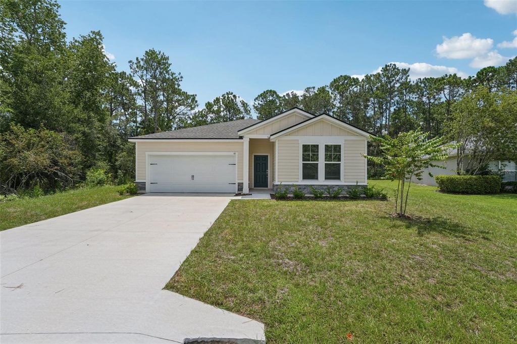 Photo of 46 Poplar Drive, Palm Coast, FL 32164 (MLS # TB8422667)
