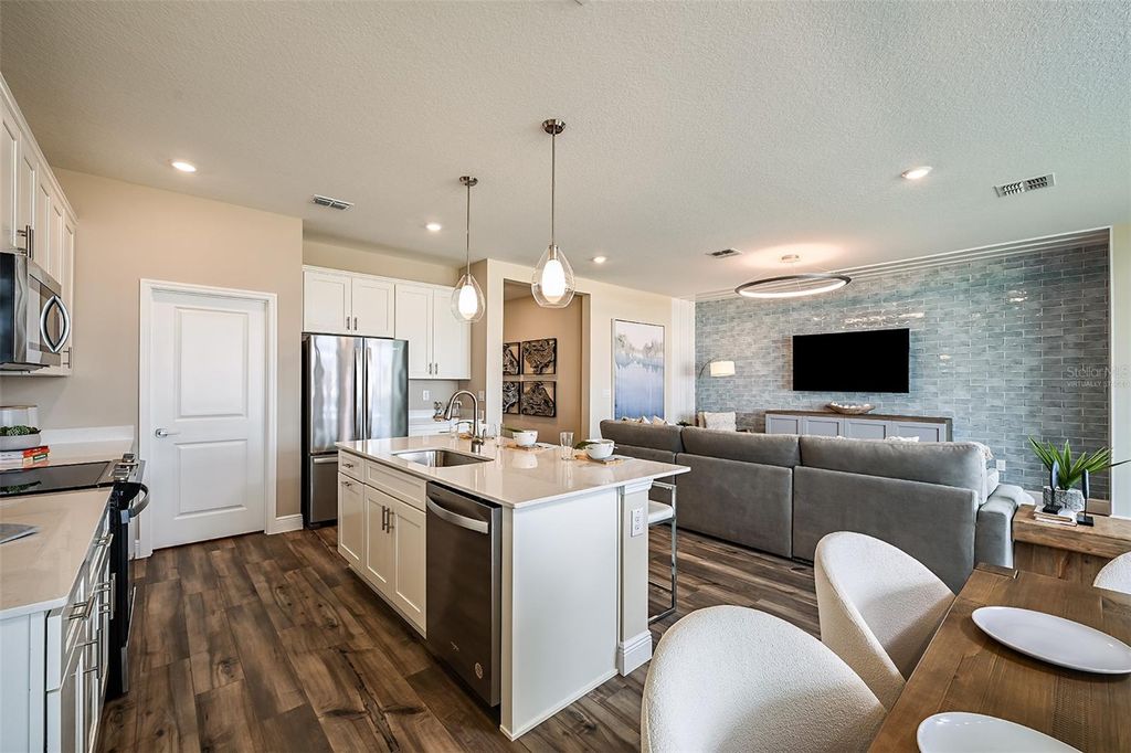 Photo of 33452 Hammock Beach Way, Wesley Chapel, FL 33545 (MLS # TB8446688)