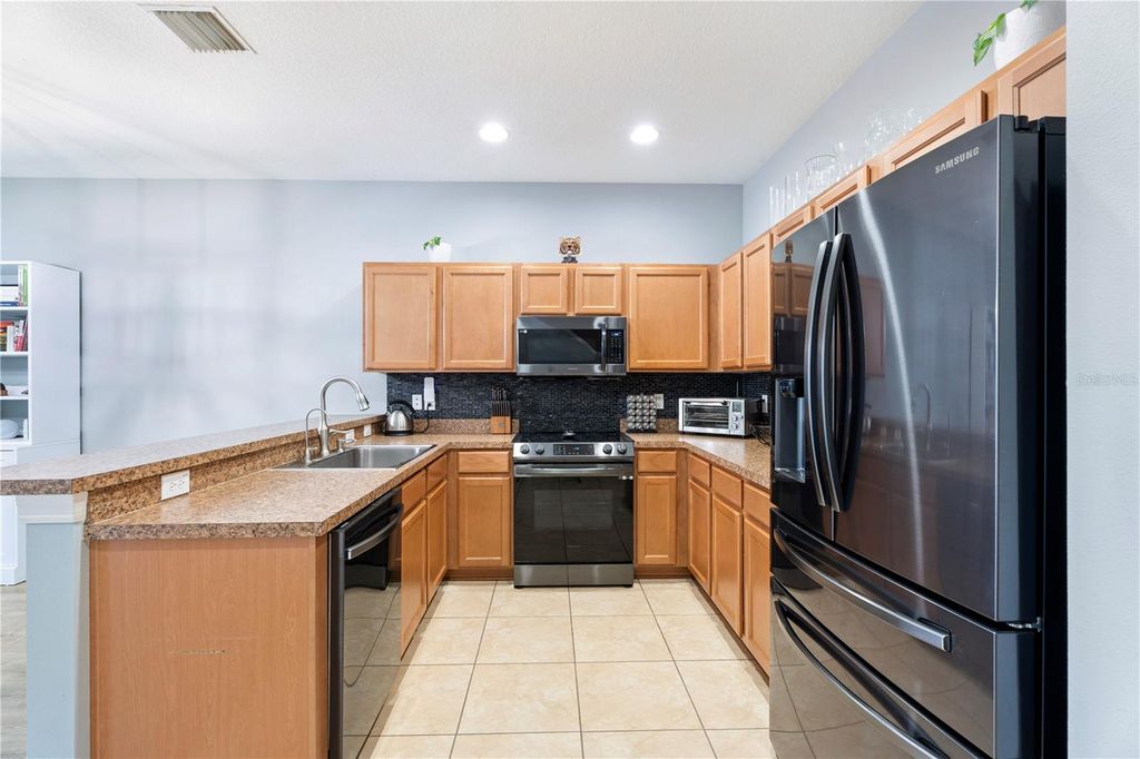 Photo of 6727 Holly Heath Drive, Riverview, FL 33578 (MLS # TB8474209)