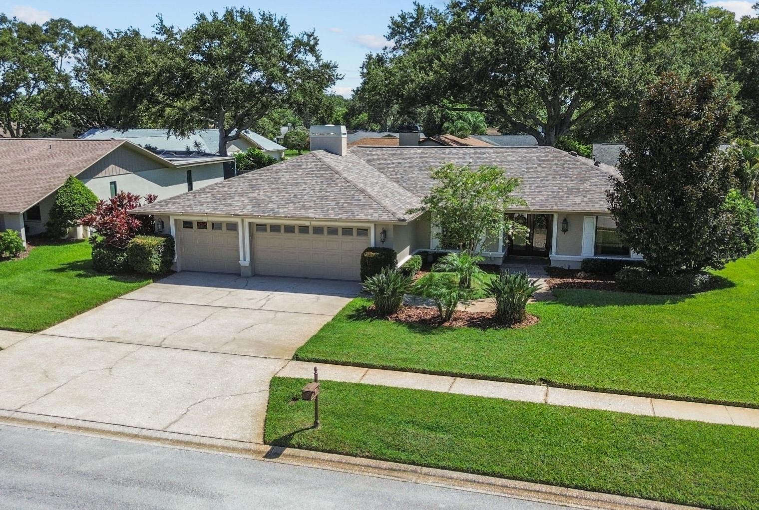 Home Sweet Home for 32 Years — Now It’s Time for Someone New to Make Memories Here.
Is that someone you?
This beautiful home welcomes you into a 2/2.5 split floor plan, ideal for home office needs with the potential for a mother-in-law suite. Along with a spotless, epoxied 3-car garage, the home also features a new dimensional roof, a newer HVAC system (2023), and a newer resurfaced saltwater pool with paver decking. The wrap-around design of the home to the lanai and fenced backyard provides both privacy and coziness to the outdoor living space — much like the coziness of the breakfast nook and wood-burning fireplace inside. Since everyone loves to gather in the kitchen, you will appreciate the long breakfast bar and the openness of the family/kitchen combo.
Is location important, then this home can’t be beat for those with a busy schedule or those who just want lifestyled convenience! Nestled between Chi Chi Rodriguez Golf Club and Countryside Country Club, between Curlew Creek Elementary and Countryside High, the Countryside Rec Center and the youth sports fields — maybe it’s the convenience of having Countryside Mease Hospital, Countryside Mall, three different Publix stores, and more restaurants than you can count just around the corner. By being positioned between the Gulf and the Bay, sitting high and dry with 72 feet of elevation in the desirable “X” Zone, meaning no flood insurance or evacuation required, this property will certainly give you peace of mind and a home in a location to love!
Opportunity knocks in Countryside for your dreams to come true — all that’s missing are your personal touches… and you!