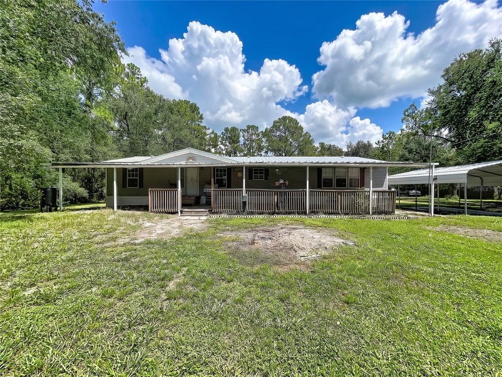 Photo of 12717 Farmettes Road, Lakeland, FL 33809 (MLS # TB8539183)