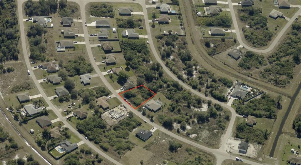 Photo of 334 Pinehurst Avenue, Lehigh Acres, FL 33974 (MLS # C7510995)