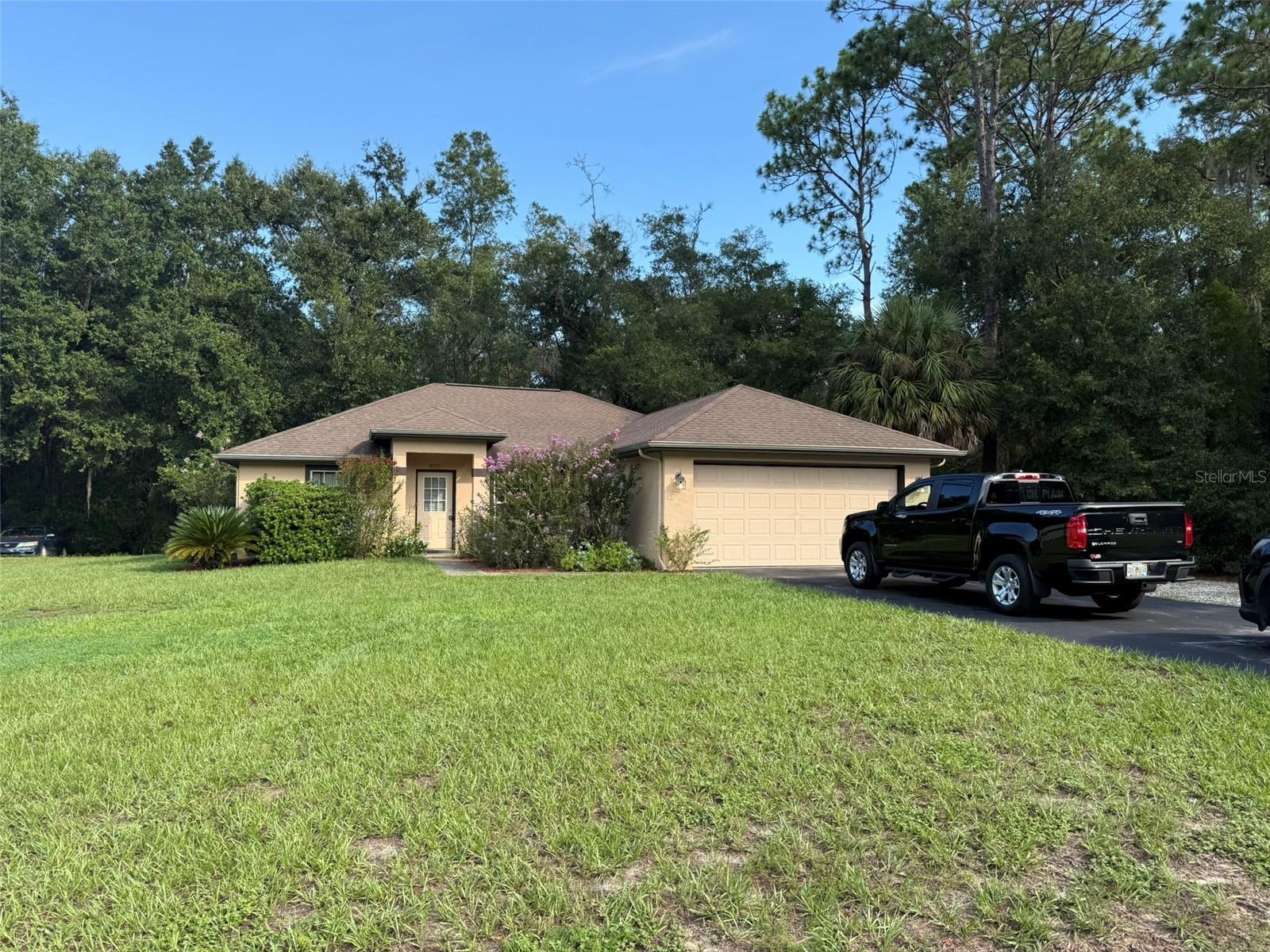 Beautifully Maintained 3-Bedroom, 2-Bath Home Between Crystal River & Dunnellon, FL
Welcome to this well-cared-for home, ideally located between Crystal River and Dunnellon. Built in 2006, this 3-bedroom, 2-bathroom residence features an open, split floor plan with vaulted ceilings, creating a spacious and airy feel throughout.
Enjoy cooking in the updated kitchen, complete with granite countertops, a breakfast bar, and upgraded stainless steel appliances. The living space flows seamlessly to a large, tiled, screened-in lanai that overlooks a serene wooded area—protected land that will never be built on—offering peace and privacy.
The beautifully landscaped yard includes a charming touch of Florida life with actual pineapples growing on-site. The two-car garage also features an extra padded area for additional parking.
Additional highlights:
New A/C (2018) – Serviced annually
New gutters (2018)
Soft water system (2018) – Maintained yearly
New sump pump (2021)
Bathtubs professionally reglazed
Driveway resealed and overlay asphalt applied (2021)
Roof – In great condition with an estimated 6–10 years of life remaining
This home has been lovingly maintained and is move-in ready. Don’t miss the opportunity to live in a peaceful, natural setting while still being close to all the amenities of both towns.