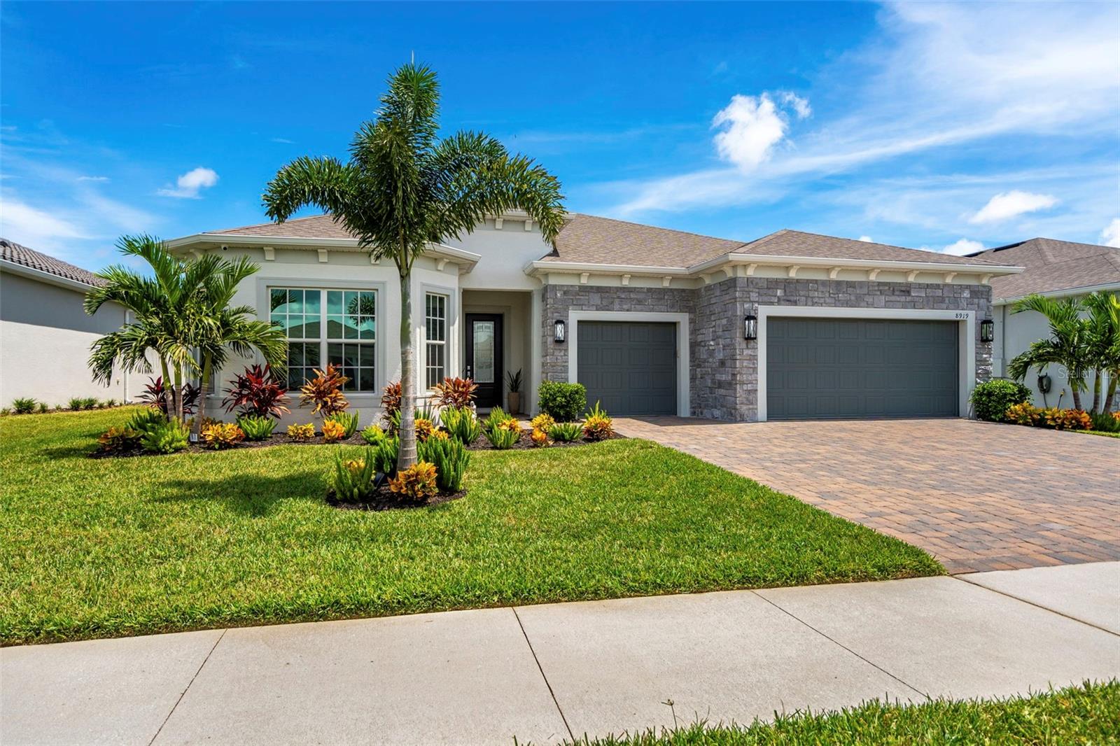 Welcome to a one-of-a-kind showpiece home in Del Webb Viera. The premier 55+ community where resort-style living meets a fully transformed custom home with quality finishes throughout. What sets this home apart is what happened after the keys were turned over. The sellers envisioned a custom home blending sophistication, comfort and functionality. The results? Just turning, two-years-old a high-quality constructed home that is completely remodeled with high end finishes. Step inside and see all the thoughtful details that elevate every room. The kitchen and pantry are a good example of the custom nature of this home. Some other examples include extensive use of custom carpentry throughout the home such as large crown molding throughout, wainscotting, shiplap, engineered wood panels and custom drop zone. Cove Lighting in the family room provides evening ambience. Bahama shutters, window treatments in family room, dining area and primary bedroom, every bathroom is completely remodeled
as well continuing the high standards of quality and refinement. Even the laundry room was given thoughtful attention including an extra built-in refrigerator. Some additional features include an upgraded a/c system and u/v light, 4' extended garage with epoxy floor, striking stone elevation and a 22k Generac whole house generator plus electronic roll-down hurricane rated see thru patio screens. Outdoors, enjoy the upgraded landscaping and great vantage point for watching rocket launches from either the screened in Lanai or sundeck.
See the attached list for all upgrades done during the extensive remodel. Beyond the home, Del Webb Viera offers a soon to be opened brand new 30,000 sq. ft. resort-style clubhouse with a tavern & Grill, Tropical zero entry pool and spa, outdoor firepits, a state-of-the-art fitness center. Currently there are 15 sports courts, dog park and countless clubs and activities to match every interest and much more. And finally, this home is nestled within Viera, -recognized as one of the top Master planned Communities in the country, where thoughtful design, natural beauty and vibrant lifestyle come together in a way few places can match.