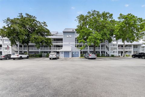 Photo of 2599 Dolly Bay Drive #305, Palm Harbor, FL 34684 (MLS # TB8512345)