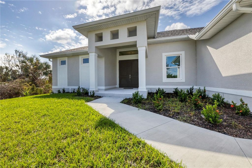 Photo of 13305 Longville Avenue, Port Charlotte, FL 33981 (MLS # C7516428)