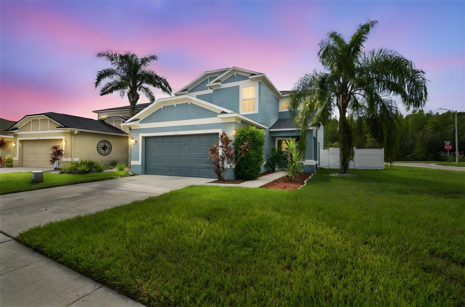 Beautiful two-story home on a corner lot in a well established community in the heart of Pasco County. Open floor plans and high ceilings makes this home very spacious and comfortable. The kitchen includes dark cabinets accented with granite countertops. New LVP throughout downstairs main areas, and tile flooring are placed in wet areas throughout the home, and NEW carpet is placed in the four large bedrooms located upstairs. The large master bathroom features a garden tub, a separate shower, dual sinks, and a walk-in closet. Because it is a corner lot, this home comes with a large, private backyard with a covered lanai, a vinyl privacy fence, and no backyard neighbors. This home is just steps away from the community pool and playground. Concord Station is located in beautiful Land O' Lakes, Florida and offers mature landscaping and water/wood conservation views. The spectacular Active Clubhouse includes a Jr. Olympic swimming pool, tot lot, playground, basketball, tennis courts, indoor billiards, over 5000 square feet of usable clubhouse space and a complete fitness center.