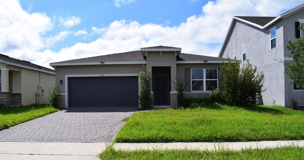 Photo of 1418 Flatwood Street, Saint Cloud, FL 34771 (MLS # S5158197)