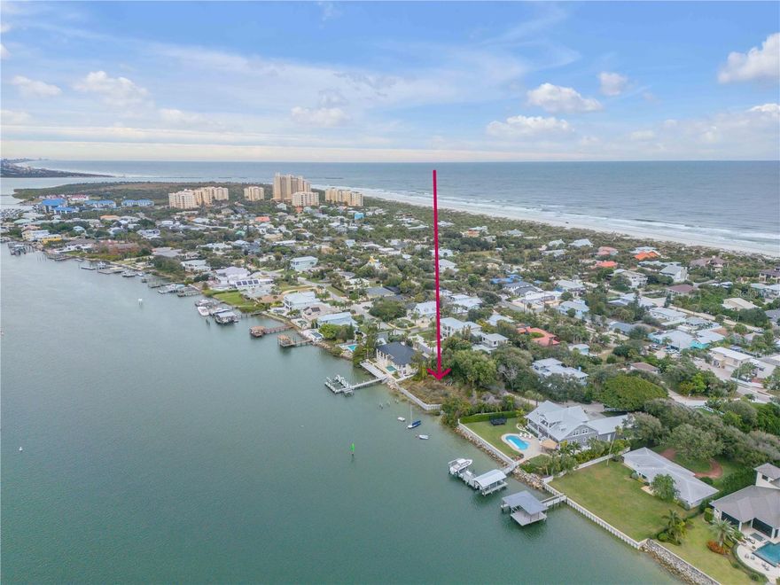 Direct Intracoastal Waterway North Beach homesite featuring a 2024 seawall and bulkhead. This desirable corner lot is located on a quiet street surrounded by multi-million-dollar homes. A thoughtfully designed multi-level residence would enjoy fabulous views of the cut just off Ponce Inlet, with easy deep-water access to the Atlantic Ocean. Beach access is conveniently located just three short blocks east via nearby walkway access. Utilities include water available at the site. The cleared lot offers an excellent opportunity to build in one of New Smyrna Beach’s most sought-after neighborhoods.