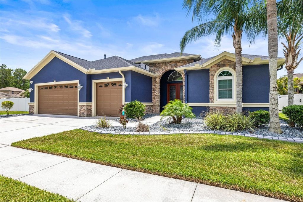 Photo of 1741 Beaconsfield Dr, Wesley Chapel, FL 33543 (MLS # TB8392226)