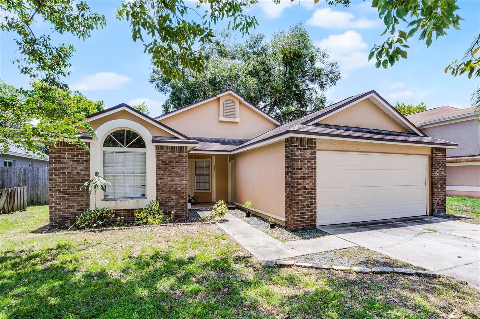 Welcome to this beautifully updated 3-bedroom, 2-bath single-story home in the highly desirable Reserve at the Crossings neighborhood of Lake Mary. Built in 1986 and offering approximately 1,165 sq ft, this home exudes modern appeal with vaulted ceilings, an open floor plan, and abundant natural light that creates a bright, airy ambiance.
As you arrive, mature oak trees and brick-accented curb appeal set a welcoming tone. Inside, the spacious great room features high ceilings and clean lines, flowing seamlessly into a spacious dining area. The chef-friendly bright kitchen offers a convenient pass-through to the dining space-perfect for casual breakfasts or entertaining. Throughout the home you’ll find luxury vinyl plank flooring, crisp new paint, and upgraded 5¼” baseboards-details buyers love for a clean, move-in ready look.
The split-bedroom layout delivers privacy and flexibility. The generous primary suite features tray ceilings and a fully updated ensuite bath, while guest/double bedrooms enjoy easy access to a refreshed hall bath. The attached 2-car garage includes laundry hookups, adding everyday convenience.
Step outside to a screened lanai overlooking a fully fenced backyard—a serene retreat for morning coffee or weekend gatherings. HOA-maintained common areas, a sidewalk-lined street and pet-friendly surroundings enhance curb appeal and neighborhood cohesion.
This home is zoned for Seminole County Public Schools, including Lake Mary Elementary (rated ~6/10 and about 1.8 mi away), Greenwood Lakes Middle (~5/10, ~0.9 mi away), and Lake Mary High School (~5/10, ~1.1 mi away) Private school options like Lake Mary Preparatory (Pre-K–12) are also nearby
Nestled in a friendly, walkable enclave of Lake Mary-where neighbors stroll with dogs, enjoy clean sidewalks, and community events are common-it’s ideal for families and commuters alike
Residents enjoy quick access to Colonial TownPark, a lively shopping and dining hub featuring upscale and casual eateries, boutiques, movies at AmStar 12, and frequent events in a charming plaza setting. Just minutes away, Topgolf Lake Mary offers high-energy entertainment with food, drinks, and social gaming. For everyday essentials and local flavor, you’ll find favorites like Krazy Greek Kitchen, Peach Valley Café, Zaza Cuban Bistro, and other well-rated spots around downtown Lake Mary and Colonial TownPark.
Coffee lovers will appreciate nearby New City Coffee and Palate Coffee for local brews and friendly ambiance
Perfectly positioned for commuters, the home offers easy access to I-4 and the 417 expressway, while the SunRail commuter station is within reach-ideal for work or weekend outings to Orlando. There's also access to scenic walking trails like Greenwood Lake Park and the Seminole Trail, plus family fun options in nearby Lake Mary parks and cultural attractions like the Lake Mary Historical Museum, performing arts studios, and regional shopping venues