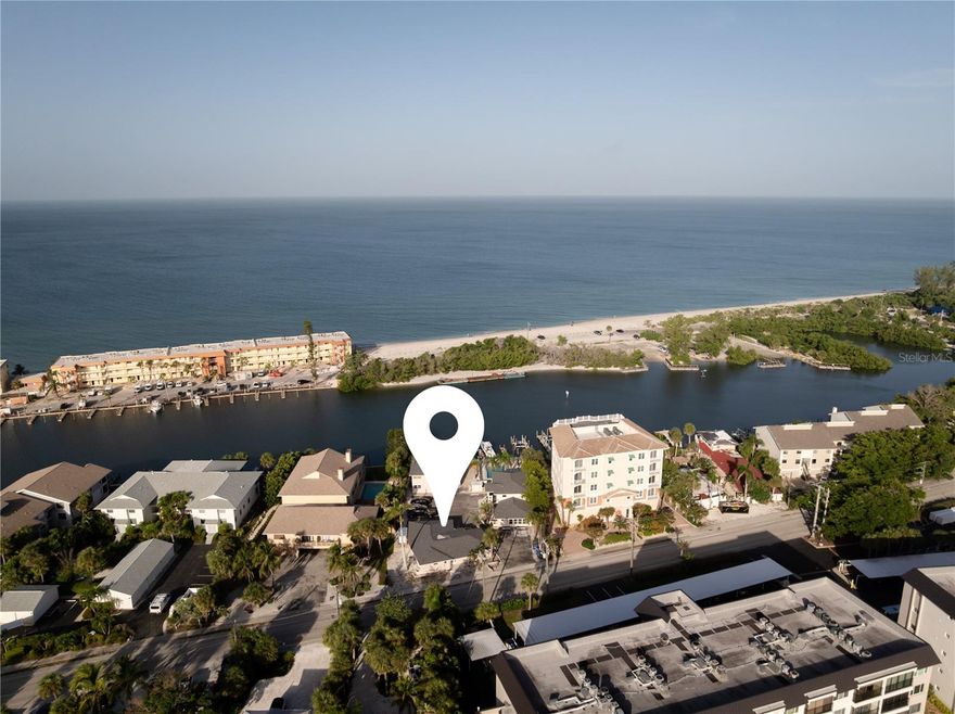 Discover the ultimate blend of coastal charm and modern luxury in this beautifully updated one bedroom one bath waterfront retreat in the highly desirable Coral Shores Condominium on Siesta Key, complete with its own private boat dock offering direct access to Sarasota Bay and the sparkling Gulf of Mexico. From the moment you arrive you will be captivated by the tranquil setting as Coral Shores is an intimate boutique community where residents enjoy privacy paired with resort style amenities. Spend your days boating, kayaking, or paddleboarding from your dock, then return to relax on your spacious private deck with plenty of room for outdoor dining and lounging beneath the Florida sun. Step inside to find an open concept layout filled with natural light, a modern kitchen with custom cabinetry, stainless steel appliances, quartz countertops, and a striking blue backsplash that flows seamlessly into the dining and living areas. The bedroom is a peaceful retreat and the upgraded bathroom offers contemporary finishes with a glass walk in shower and spa inspired details. Coral Shores residents benefit from private storage, laundry facilities, guest parking, and a waterfront setting with breathtaking views of Little Sarasota Bay. World famous Siesta Key beaches are just minutes away along with Turtle Beach, Crescent Beach, and Point of Rocks snorkeling. Siesta Key Village offers boutique shopping, live music, and dining from casual seafood spots to upscale waterfront restaurants, while downtown Sarasota provides theater, galleries, and cultural events only a short drive away. This property is ideal as a full time residence, seasonal retreat, or investment property.