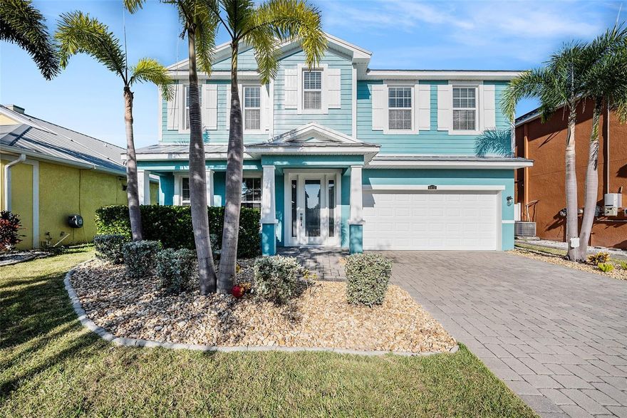This gorgeous two-story home is nestled in a tranquil gated, waterfront community of Bimini Bay which is situated in the heart of Apollo Beach. Welcome to your very own coastal oasis home offering a captivating blend of enchanting natural beauty and tranquil views. Nestled in a charming small town with easy access to the bay, this home offers the perfect blend of comfort, style, and functionality for family living and entertaining. The recently renovated kitchen is a chef’s dream, featuring extended granite countertops, an oversized island, and ample cabinetry for storage. Enjoy the convenience of a large walk-in pantry, perfect for keeping your kitchen organized and clutter-free. The kitchen seamlessly opens to a cozy breakfast nook and a bright living room, creating a warm and inviting space for everyday living. A formal dining room and separate family room downstairs provide plenty of room for gatherings and special occasions. The spacious primary suite includes a bonus room, perfect for a nursery, private office, or sitting area. The primary bedroom boasts a generous walk-in closet designed to combine style and functionality. The renovated en-suite bathroom boasts a garden tub, walk-in shower, and double vanity sinks.  Also, upstairs offers three additional generously sized bedrooms offer comfort and privacy for the whole family. The laundry room is conveniently located upstairs with all the bedrooms and offers extra storage space. The 2-car garage has plenty of room so bring your toys, bikes and extra vehicles. Enjoy sunny Florida living at its best!!! Flip flops are highly recommended, wear lots of sunscreen, relax, hang up your towel, soak up the sun, enjoy sipping, grilling and chilling on your amazing extended lanai overlooking the peaceful saltwater canal! Boating enthusiasts will appreciate the private boat lift and direct access to the bay. Exterior and interior freshly painted in 2025, giving this home a bright and modern feel. The fully remodeled kitchen (2020) features contemporary finishes, quality cabinetry, and updated appliances — perfect for entertaining or everyday living. Step outside to a brick paver walkway leading to your private boat lift with direct saltwater canal access — ideal for boating enthusiasts. Enjoy true Florida living with both style and convenience! The home’s metal roof adds both modern appeal and exceptional longevity. Private gated community with low HOA & NO CDD. Conveniently located near restaurants, shopping, schools, Downtown Tampa, Busch Gardens, MacDill Airforce, Selmon Expressway, I75, I4, US41 & US301. Call today!