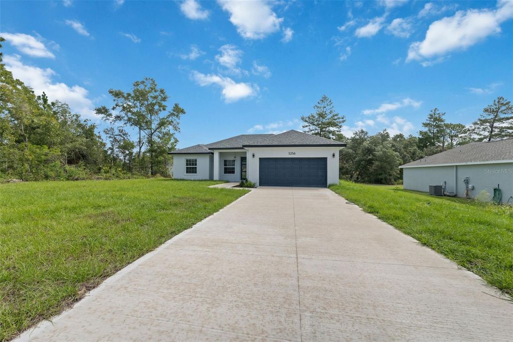 Photo of 5256 SW 155th Loop, Ocala, FL 34473 (MLS # O6350769)
