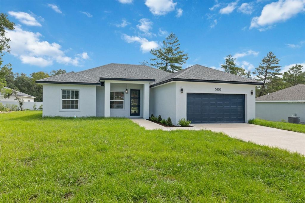 Photo of 5256 SW 155th Loop, Ocala, FL 34473 (MLS # O6350769)