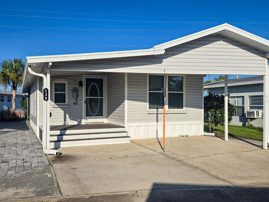 This bright 2BR/2BA manufactured home sits in a gated, active 55+ lakefront community with clubhouse, pool, shuffleboard. Move-in ready: updated windows, new washer/dryer and water heater, recent re-pipe, refreshed bath and bedroom floors—passed recent 4-point inspection. A spacious family room opens to a large screened patio with new fans and winter curtains. The entertainer's kitchen offers an eat-in island, ample cabinets, and a built-in coffee bar.  Watch rocket launches and enjoy quick access to Orlando International Airport, attractions, and the famous Cocoa Beach. Must see! Home also for sale at MLS# 1053352