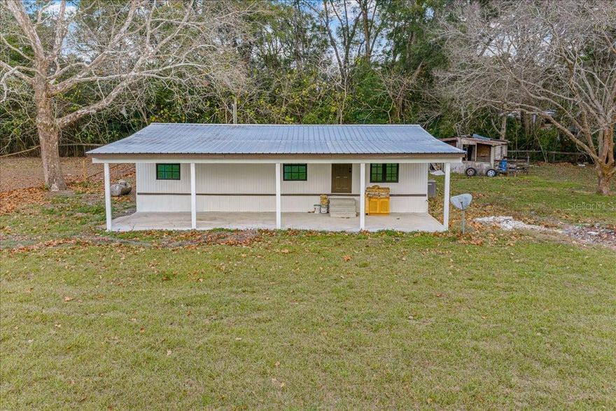 Completely remodeled mobile home situated on a beautiful 2-acre fully fenced and wired lot in Ocala! This move-in-ready property offers the perfect blend of modern updates and wide-open space, ideal for those seeking privacy, flexibility, and room to grow.
The home has been thoughtfully renovated throughout, featuring updated flooring, a refreshed kitchen and bathrooms, modern fixtures, and a clean, contemporary feel. The open layout provides comfortable living and natural light, making it perfect for everyday living or entertaining.
Outside, enjoy two fully fenced acres, ideal for animals, gardening, storage, recreational vehicles, or future expansion. The wired fencing adds convenience and security, while the expansive lot offers endless possibilities—no HOA restrictions.
Located just minutes from shopping, dining, schools, and major roadways, this property offers country living with easy access to town. Perfect for homeowners, investors, or anyone looking for space, freedom, and a turnkey home.
Schedule your private showing today—this unique property won’t last!