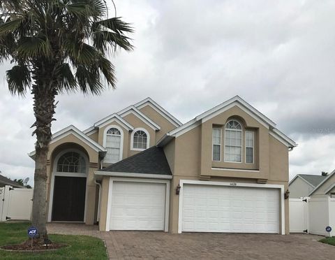Photo of 6628 Bouganvillea Crescent Drive, Orlando, FL 32809 (MLS # O6419316)