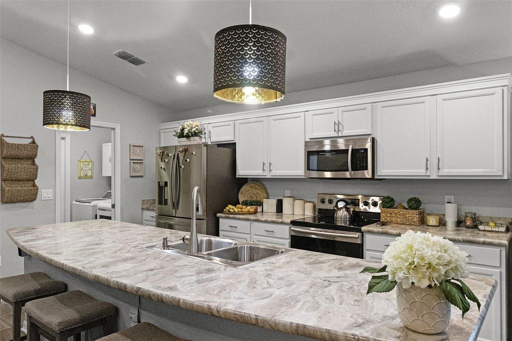 Photo of 475 Monticelli Drive, Haines City, FL 33844 (MLS # O6329537)