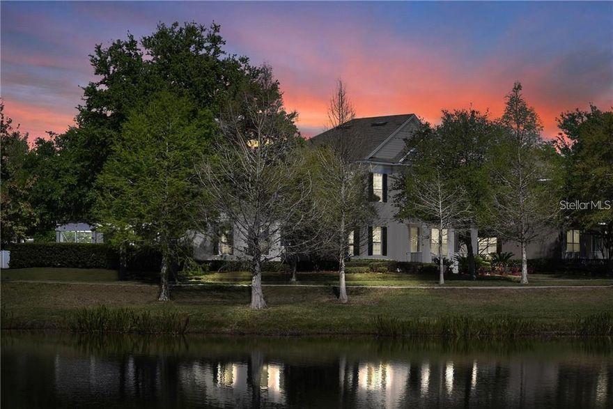 Beautifully positioned on a private pond-front corner lot within the guard-gated community of Keene’s Pointe, this residence offers the perfect blend of space, comfort, and timeless design.

Designed for both everyday living and effortless entertaining, the home features 5 bedrooms, 4.5 bathrooms, and a thoughtfully designed floor plan with formal living and dining rooms, a dedicated office, and an upstairs bonus room.

At the heart of the home, the spacious gourmet kitchen is equipped with 42” solid wood cabinetry, double ovens, a gas range, and a center island—opening seamlessly to the expansive family room with rich wood flooring and French doors that invite indoor-outdoor living.

Step outside to your private backyard retreat, where a covered lanai overlooks the screened pool and spa, framed by architectural columns and lush landscaping—creating a peaceful setting with added privacy from the corner homesite.

The first-floor primary suite offers a quiet escape, tucked away from the main living areas, while upstairs you'll find four additional bedrooms and a versatile bonus room, currently set up as a theater.

Located in one of Windermere’s most sought-after communities, residents of Keene’s Pointe enjoy access to the Golden Bear Club, featuring a Jack Nicklaus Signature Golf Course, as well as the Butler Chain of Lakes and a lifestyle that is truly second to none.