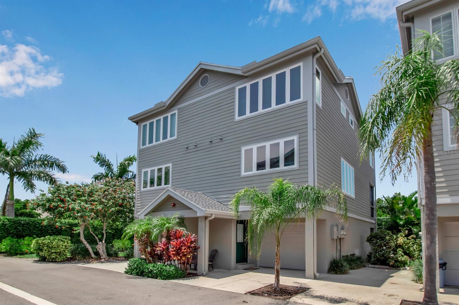 Seize the opportunity to acquire a prime, elevated townhome in Cedars East on beautiful Longboat Key. This location is arguably the closest Cedars East property to the pristine, sugar-white sands of the Gulf. This Pet-friendly townhome is an Elevated structure, positioned well above the flood plain, ensuring peace of mind. The interior exudes sophistication, featuring stunning crown molding and newer tile flooring throughout the main living areas. The kitchen has undergone beautiful updates, including shaker cabinets, granite countertops, stainless steel appliances, and a beautiful stone backsplash. These premium materials are consistently applied across all three bathrooms, enhancing the home's cohesive design. Ideally open floor plan, The kitchen, complete with a convenient snack bar, seamlessly transitions into the dining ,family room & lanai. Beautiful furnishings throughout, which are included in the sale, making this a truly turn-key offering. The primary bedroom is generously proportioned, featuring a wall of windows for abundant natural light and picturesque views. Its en-suite bathroom is equally spacious, boasting dual vanities. The guest bedroom is ample & includes a walk-in closet. A full-sized laundry room is conveniently located adjacent to the bedroom space.
This meticulously maintained residence presents an ideal proposition for both personal enjoyment & lucrative rental income, boasting a flexible two-week minimum rental allowance. With an approximate gross annual income of $50,000, even with several months of owner occupancy or vacancy, this property offers substantial returns. A rare asset on Longboat Key, the oversized garage includes a substantial storage closet, perfect for accommodating hobbies and recreational gear. The exterior received a comprehensive upgrade in 2018 with the installation of low-maintenance Hardi Board Siding and all new High-Impact Windows. In 2023, a brand-new hurricane-rated garage door was installed, further enhancing the home's resilience. Both air conditioning units were replaced in 2021, ensuring optimal comfort and efficiency. Finally, 2024 brought a brand new roof.
Cedars East offers the convenience of on-site rental management, if desired. This 66-acre village-like townhome community is enveloped by nature, providing effortless access to both the beach and the bay on the beautiful north end of Longboat Key. The spacious and tropical community features lit boardwalks winding through mangroves, leading to an array of exceptional amenities including a heated Jr. Olympic Size Pool, nine Har-Tru Tennis Courts, three Pickleball courts, a Clubhouse with a Pro-Shop, a 24-hour Fitness Center, a Tiki bar, a restaurant, a fishing pier, and a kayak launch. Please note that some amenities require an additional club membership.
The property is within walking distance to a variety of local attractions, such as Harry's Deli & Continental Kitchen, the true island gem that is Joan Durante Park, Euphemia Haye Restaurant & The Haye Loft, and, of course, Longboat Key's globally renowned sugary white sand beaches. Furthermore, it offers convenient proximity to other major attractions and cultural venues, including St. Armand's Circle, Mote Aquarium, the Asolo Repertory Theatre, Van Zel Performing Arts Center, Marie Selby Gardens, Anna Maria Island, the Ringling Museum complex, and numerous dining options on Longboat Key and in downtown Sarasota. Lots to love here, come see it today.