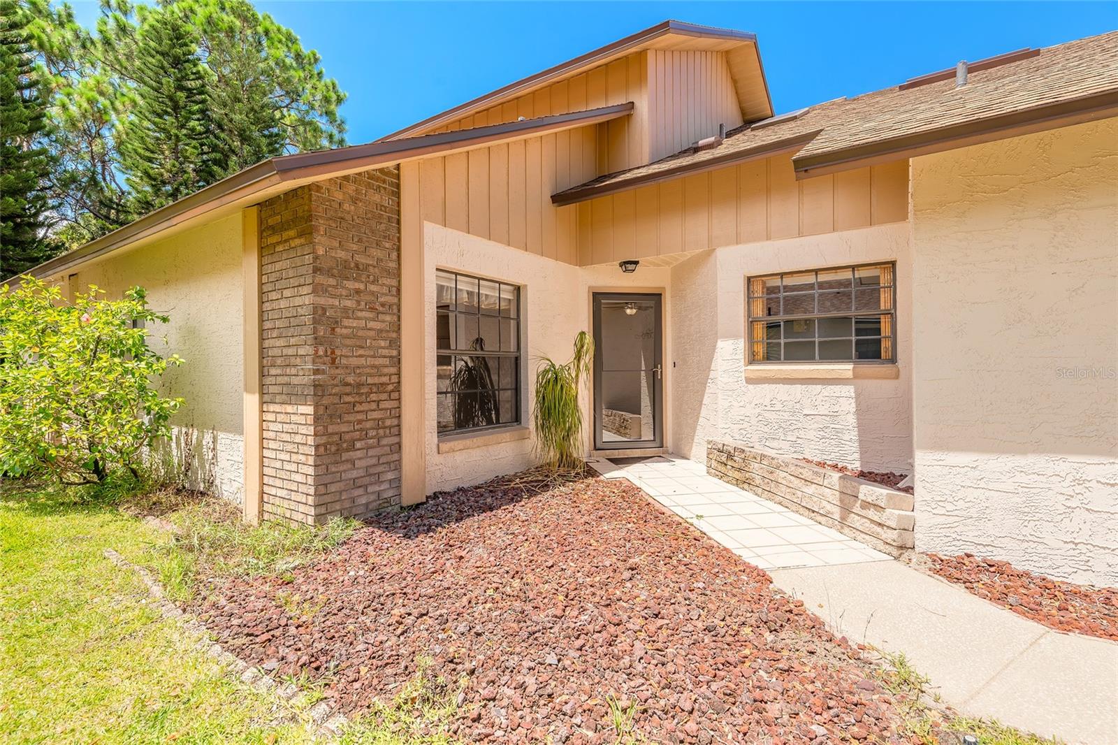 Beautiful and well-maintained 3 bedroom, 2 bathroom townhome located in the highly desirable Riverwood Plantation community in Port Orange, just minutes from the beach and conveniently situated off Spruce Creek Road near shopping, dining, and top-rated schools. This home features a functional layout with spacious living areas, a well-appointed kitchen, and a private outdoor space perfect for relaxing or entertaining. The primary suite includes an en-suite bath and walk-in closet. The two guest rooms and bath are located on the main level. Recent upgrades include a new roof installed in 2023, new washer and dryer in 2024, and a new storm door replaced in 2024. Riverwood Plantation offers exceptional amenities including a clubhouse with a full kitchen, swimming pool, pickleball, racquetball, basketball and tennis courts, nature boardwalk ending in fishing pier and gazebo, and private boat launch to the Spruce Creek River—all just steps from your backyard. HOA fees include weekly lawn mowing, fertilization, irrigation system maintenance, exterior painting, pressure washing, and access to RV/boat storage (assigned spots as available). Enjoy a low-maintenance lifestyle with resort-style living in one of Port Orange’s most sought-after communities. All information is intended to be accurate, but is not guaranteed.