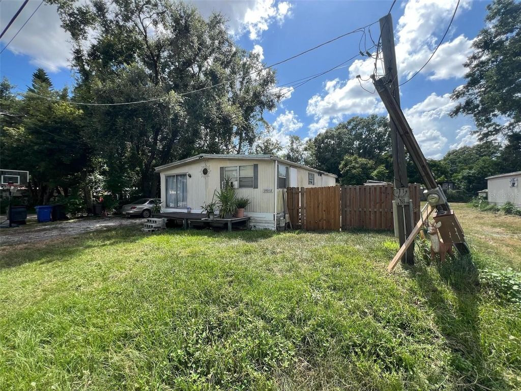 Photo of 18302 Crooked Lane, Lutz, FL 33548 (MLS # O6333669)