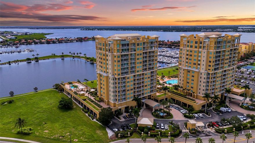 Wake up to panoramic Manatee River and Riviera Dunes Marina views from this exceptional 7th-floor corner waterfront residence in Bel Mare, where a semi-private elevator foyer opens to soaring ceilings, walls of glass, and a spacious east-facing balcony perfectly positioned for spectacular waterfront sunrises. This beautifully designed 2-bedroom, 2-bath condominium offers the ideal blend of elegance, comfort, and coastal lifestyle within the sought-after Bel Mare at Riviera Dunes waterfront community. The corner location and expansive windows fill the home with natural light while framing sweeping river and marina views that create a stunning backdrop throughout the main living areas. The open living and dining spaces are thoughtfully designed for both everyday living and entertaining, flowing seamlessly to the expansive balcony overlooking the Manatee River and Riviera Dunes Marina; a perfect setting to enjoy morning coffee, evening breezes, and the activity of boats passing through the marina. The primary suite serves as a tranquil retreat, offering dual vanities, a spacious walk-in shower, and generous closet space. The home features three walk-in closets, providing exceptional storage rarely found in waterfront condominiums. The primary bedroom enjoys views of the Riviera Dunes Marina and the popular next door restaurant Riviera Dunes Dockside known for its vibrant waterfront dining and live music. Additional features include two reserved covered garage parking spaces and a climate-controlled storage unit, offering convenience and practicality for full-time residents or seasonal living. Residents of Bel Mare at Riviera Dunes enjoy a true resort-style waterfront lifestyle with amenities that include: four resort-style swimming pools and hot tubs, outdoor grilling areas and waterfront gathering spaces, theater room with stadium seating, billiards room and library, social and conference rooms, two guest suites available for visiting friends and family As an added benefit, residents enjoy access to the nearby Palmetto Marriott Resort & Spa Beach Club, offering a 24-hour fitness center, lap pool, resort-style pool, pickleball courts, lawn games, and a 9-hole putting green. The resort also hosts outdoor concerts, events, spa services, and wellness classes, adding to the vibrant waterfront lifestyle. Located along the Riviera Dunes waterfront in Palmetto, this residence is just minutes from the sandy beaches of Anna Maria Island, Longboat Key, and Lido Key, as well as IMG Academy, championship golf courses, downtown Sarasota, and Sarasota-Bradenton International Airport (SRQ), with Tampa International Airport approximately 45 minutes away. This exceptional residence offers the opportunity to enjoy luxury waterfront living with panoramic river and marina views in one of the Gulf Coast’s most established resort-style communities.