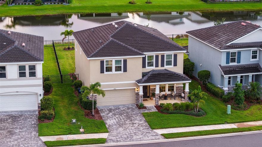 WELCOME TO YOUR DREAM HOME AT 17832 GULF RANCH PLACE! *** Centrally Located in the Highly Desirable Community of Star Farms at Lakewood Ranch. Tucked Away from Noisy Exterior Street Traffic, this Stunning D.R. Horton Emerald Series Holden Model offers Spectacular Water Views and an Unmatched Level of Luxury. *** STUNNING INTERIOR UPGRADES: Step Inside to Discover a Beautifully Repainted Interior featuring Custom Wood Paneling in the Entryway and Office. Upscale Wallpaper Enhancements and Custom Lighting Upgrades Elevate the Space. The Heart of the Home showcases a Custom Media Wall Complete with Built In Shelving, Ambient Lighting, and a Cozy Built In Fireplace. The Kitchen and Bathrooms feature Upgraded Faucets, and Custom Window Treatments have been Added Throughout the Entire Home. *** BEDROOMS & CONVENIENCE: The Master Suite is a True Retreat Offering Custom Closet Upgrades, while Bedroom Two includes a Spacious Walk In Closet. Everyday Convenience is Maximized with a Custom Drop Zone at the Garage Entry. *** GARAGE & HOME SYSTEMS: The Upgraded Garage features an Amazing Epoxy Coating, Ceiling Mounted Storage Racks, and an Insulated Garage Door to keep things cool and Protect Against the Florida Heat. For Total Peace of Mind, the Property is Equipped with a Whole Home Water Filtration System and a UV Light Added to the HVAC System. *** OUTDOOR OASIS: Experience the Ultimate Florida Lifestyle in your Fully Fenced Backyard. Relax on the Screened In Lanai and take in the Tranquil Water Views right from your own Private Oasis. *** RESORT STYLE AMENITIES: Living in Star Farms means enjoying World Class Amenities right outside your door. Spend your days at the Incredible Clubhouse featuring a Poolside Bar and Grill along with a Cafe for the Ultimate Convenience and Relaxation. Schedule Your Private Tour Today and Make This Move In Ready Masterpiece Yours!
