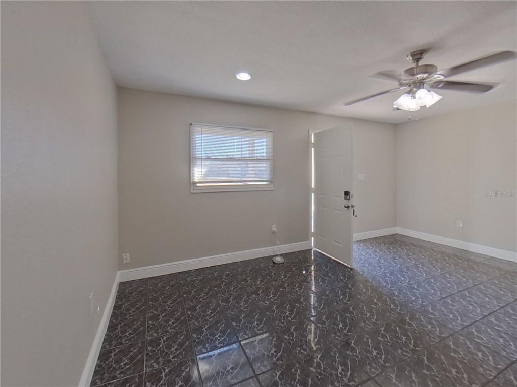 Photo of Orlando, FL 32810 (MLS # TB8474636)