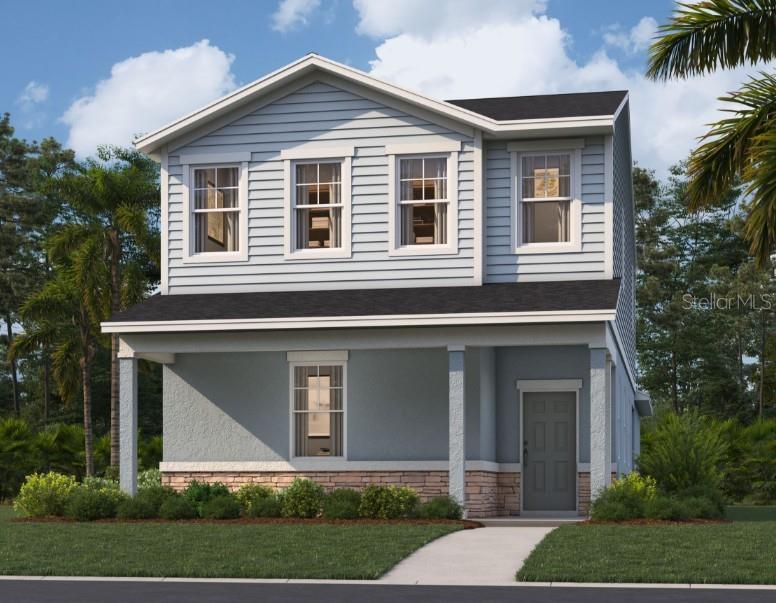 One or more photo(s) has been virtually staged. Under Construction. Stanley Martin builds new construction homes in the Brack Ranch community in St. Cloud, Florida. This neighborhood is ideally located: midway between downtown Orlando and the beaches of Florida's east coast. You'll have the best of both worlds: the excitement of the city and the tranquility of the coast right at your fingertips. Downtown Orlando and its famous theme parks are just 25 miles away, and I-95 is only 35 miles away, making for an easy commute. With easy access to SR-417, SR-528, US-192, and Florida's Turnpike, your commute will be a breeze. Plus, with Orlando International Airport just a 15-minute drive away, travel is a breeze. It's not just about the surroundings: Brack Ranch is packed with amenities designed to enhance your lifestyle. Take a dip in the pool, relax in our clubhouse, or explore the many hiking trails.
Stanley Martin presents the Overton, a brand-new home with an open-concept layout, a two-car rear garage, and energy-efficient features, ideal for both entertaining and relaxing. The first floor features a spacious kitchen with a walk-in pantry for added storage, a dining room, a living room, and a powder room, complemented by a covered deck. Before heading upstairs, you'll find the first guest bedroom. Upstairs, discover a primary suite with a walk-in closet and a bathroom with a double vanity. Additionally, a conveniently located laundry room awaits to save you the hassle of hauling laundry. Enjoy flexible space for fun, along with two additional bedrooms upstairs for family members or guests. The Overton achieves the perfect harmony between low-maintenance living and the spaciousness of a split-level single-family home.