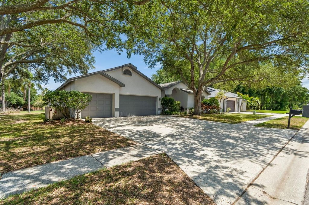 Photo of 5488 Oakridge Drive, Palm Harbor, FL 34685 (MLS # TB8505514)