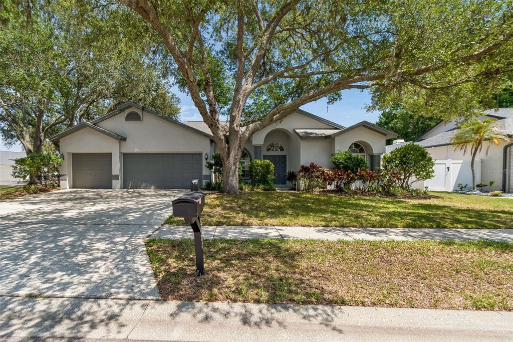 Photo of 5488 Oakridge Drive, Palm Harbor, FL 34685 (MLS # TB8505514)