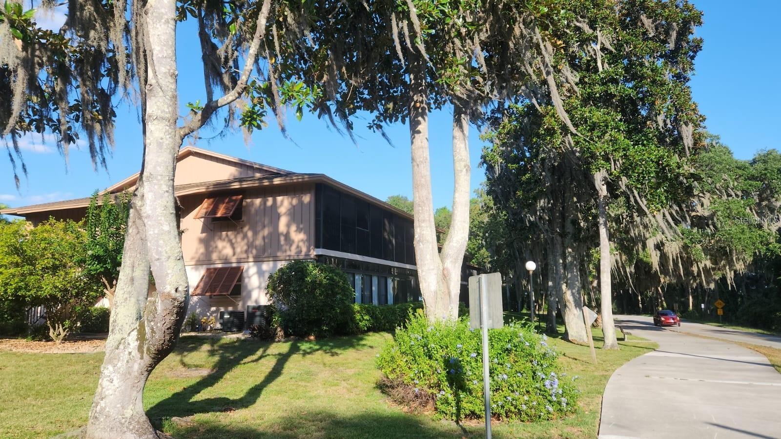 FINALLY! A WATERFRONT SECOND STORY UNIT HAS COME TO THE MARKET! Calling all nature enthusiasts and adventure seekers! Welcome to your Deltona CORNER UNIT condo situated in the community of Edgewater Condominiums. Perched on the second floor, this impressive corner unit offers expansive views of Lake Monroe, creating a serene backdrop for your everyday life. This 2-bed, 2-bath layout features granite countertops, stainless steel appliances, and new flooring in the main area, adding a touch of contemporary design. Embrace the outdoors from the comfort of your screened-in balcony or take advantage of the miles of sidewalks and nature trails throughout the community. Thornsby Park's Inspiration Playground, Gemini Springs, the Deltona Community Center, and the Lake Monroe boat ramp are all just a leisurely walk away, offering endless recreational opportunities. Need to stock up? Publix, several convenience stores, and a variety of restaurants are within easy reach. It's literally just a short walk! Schedule an appointment today to check out this rare opportunity to own one of these units located along Lake Monroe.