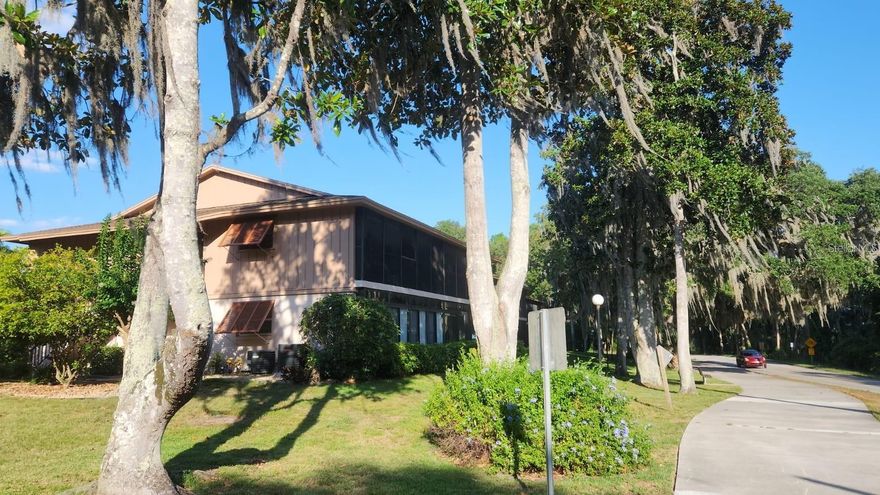 FINALLY! A WATERFRONT SECOND STORY UNIT HAS COME TO THE MARKET! Calling all nature enthusiasts and adventure seekers! Welcome to your Deltona CORNER UNIT condo situated in the community of Edgewater Condominiums. Perched on the second floor, this impressive corner unit offers expansive views of Lake Monroe, creating a serene backdrop for your everyday life. This 2-bed, 2-bath layout features granite countertops, stainless steel appliances, and new flooring in the main area, adding a touch of contemporary design. Embrace the outdoors from the comfort of your screened-in balcony or take advantage of the miles of sidewalks and nature trails throughout the community. Thornsby Park's Inspiration Playground, Gemini Springs, the Deltona Community Center, and the Lake Monroe boat ramp are all just a leisurely walk away, offering endless recreational opportunities. Need to stock up? Publix, several convenience stores, and a variety of restaurants are within easy reach. It's literally just a short walk! Schedule an appointment today to check out this rare opportunity to own one of these units located along Lake Monroe.