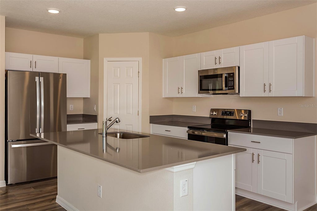Photo of 5394 San Pietro Drive, Winter Haven, FL 33884 (MLS # TB8525568)