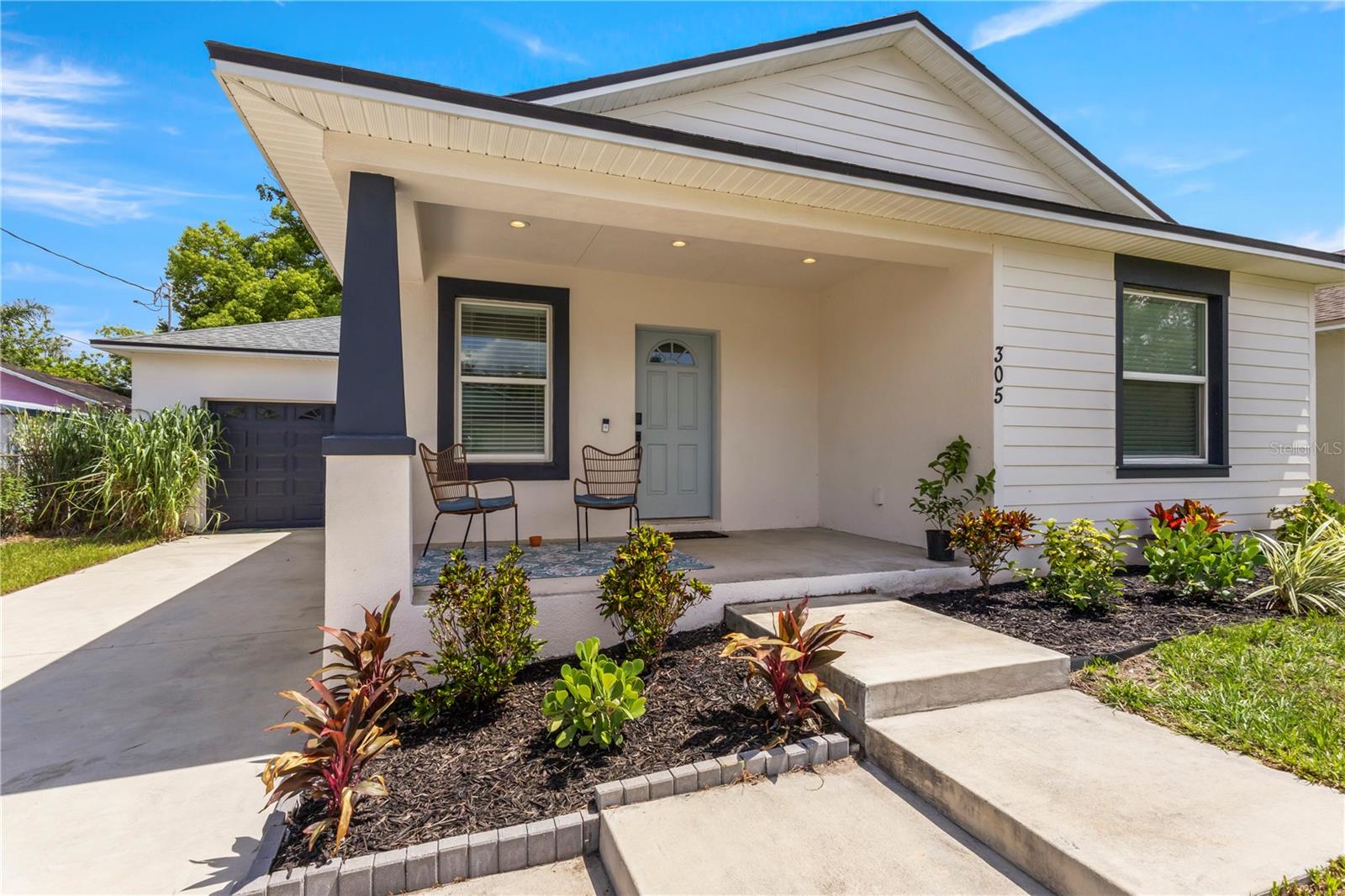 Welcome to 305 W 9th St, where modern design meets timeless comfort. This beautifully updated 4-bedroom, 2-bathroom home offers 1,716 square feet of well-planned living space — perfect for first-time buyers or anyone looking to plant roots in a thriving, up-and-coming area.
Built in 2021 and refreshed in 2025, this home features a desirable split floor plan and is located in the rapidly redeveloping Midtown CRA District. It's an ideal opportunity to own in one of Lakeland’s most promising neighborhoods.Step inside to a bright, open-concept living space enhanced by stylish finishes and functional upgrades. The sleek kitchen is a true showstopper, with granite countertops, shaker-style cabinetry, a built-in dining table, and Samsung stainless steel smart appliances. The oversized 1-car garage provides ample storage, and the walk-in pantry adds to the thoughtful layout.
Additional highlights include:
Samsung washer and dryer on pedestals in a full-size laundry room,
Dual vanities and private toilet closets in both bathrooms, with subway tile and brushed nickel finishes,
Motion-sensor lighting in the laundry room, pantry, and primary closet,
Upgraded interior door hardware, designer ceiling fans and light fixtures, and
Smart home features like a Nest thermostat and smart front door lock and ring camera door bell.
-Two linen closets for extra storage
Beyond your front door, you’re just minutes from Lakeland’s top attractions. Enjoy the award-winning Bonnet Springs Park (voted Florida’s #1 park), grab food and drinks at The Joinery, or explore the rich culture and entertainment of Downtown Lakeland — all just around the corner.
Situated in a designated redevelopment zone, this home also qualifies for Lakeland’s Down Payment Assistance Program, offering up to $50,000 in support for eligible buyers — making homeownership more accessible than ever.
Don’t miss this rare chance to own a move-in-ready, modern home in a growing, high-potential neighborhood. 305 W 9th St isn't just a starter home — it’s the beginning of something lasting.