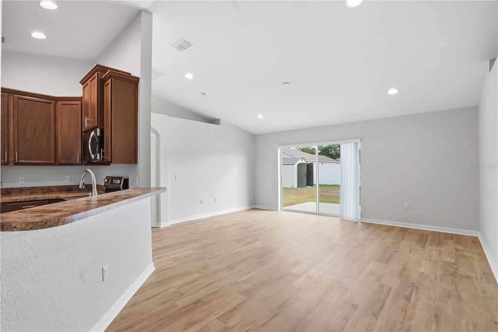 Photo of 5147 Magnolia Preserve Boulevard, Winter Haven, FL 33880 (MLS # TB8462440)