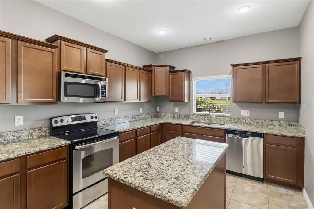 Photo of 609 Tanana Fall Drive, Ruskin, FL 33570 (MLS # TB8550270)