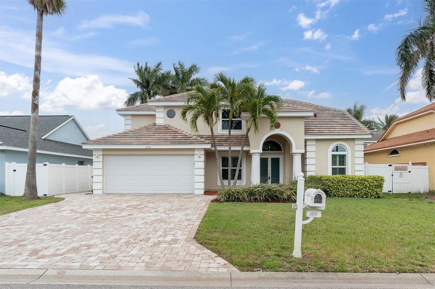 One or more photo(s) has been virtually staged. Stunning 3/3 2 car garage pool home in beautiful Tierra Verde.  As you enter the home the vaulted ceilings immediately open up the living space.  Nice open area with kitchen, and 2 living areas, with a separate dining area. The primary bedroom is on the first floor, which is very spacious with sliding doors leading out to the pool from the bedroom. There is a large custom made walk- in closet with additional space for storage.  The primary bathroom is massive with a unique wrap around double sink and vanity.  The bathroom was updated with a stand up shower, tiling, and a garden tub.  There is a separate water closet, which is very convenient. Hurricane impact sliders lead out to your own personal oasis.  A large and extended, covered patio area with a newly screened bird cage in 2025.  Large pool with a spa that was resurfaced with Pebble Tec in 2017, re-piped with new plumbing in 2025, and a brand-new pool filter in 2025.  Suburban gas tank and pool/ jacuzzi water heater in 2022, enjoy using the pool year- round. A peaceful and tropical landscaping surrounding the backyard helps provide privacy and a feeling of living in your own personal resort. There are multiple (5) access points to the pool. Spacious and open kitchen with stainless steel appliances, granite countertops, a new Bosch dishwasher in 2025, and new built in microwave 2024.  The kitchen opens up to the second living room/den area.  This is a multi- purpose room with endless uses and a large space to utilize.  The 3rd bathroom is adjacent to the 2nd living room, leading out to the pool.  There is an interior laundry room that is directly off of the kitchen with a sink and storage area.  Many updates in the home include a new tile roof in 2025 no worries of having any roof issues for decades.  Newer hurricane- impact windows and doors throughout the home, along with a new garage door in 2021, providing peace of mind and improved energy efficiency. The plantation shutters are great for providing superior light control, enhanced privacy. The average monthly Duke bill is $210. A new paver driveway was installed in 2020, and the garage floor was epoxy-coated in 2022. All bathrooms were completely updated in 2017.  There is also a water softener system and water purification for drinking water.  Upstairs boasts 2 bedrooms and 1 bathroom with space for a desk/work station in the extended hallway. A Smart Tint door provides privacy at night by the flick of a button to prevent anyone from seeing in or lights from coming through the door. Welcome to the serene lifestyle of paradise that is Tierra Verde.  Just minutes away from world class beaches, St. Pete Beach, Pass- A- Grille and easy access to vibrant downtown St. Pete. This utopia of island living is located perfectly.  Isla Del Sol Yacht & Country Club is just down the road, which offers a top-rated golf course along with tennis, pickleball, high-end dining, and many social events.  Tierra Verde is packed with popular restaurants that range from highly rated to very casual, giving you options for any occasion. Tierra Verde is minutes from Fort De Soto, which boasts renowned beaches, biking trails, campgrounds, and first-class kayaking and paddleboarding. Bring your dogs to the waterfront dog park and enjoy the grounds of the historic fort. No damage or flooding from the storms at all, well situated and built up. Assumable VA loan for qualified veterans at 2.75%.